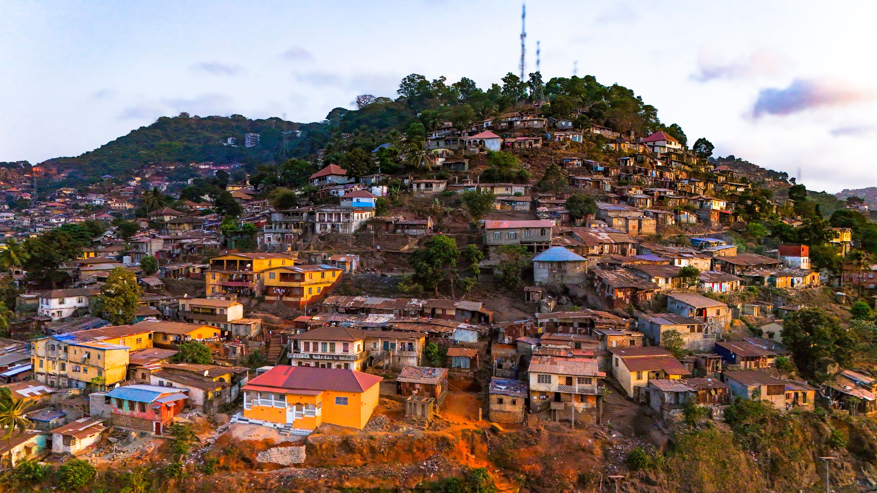 A vibrant aerial view of Mount Aureol and its colorful houses in Freetown, Sierra Leone.