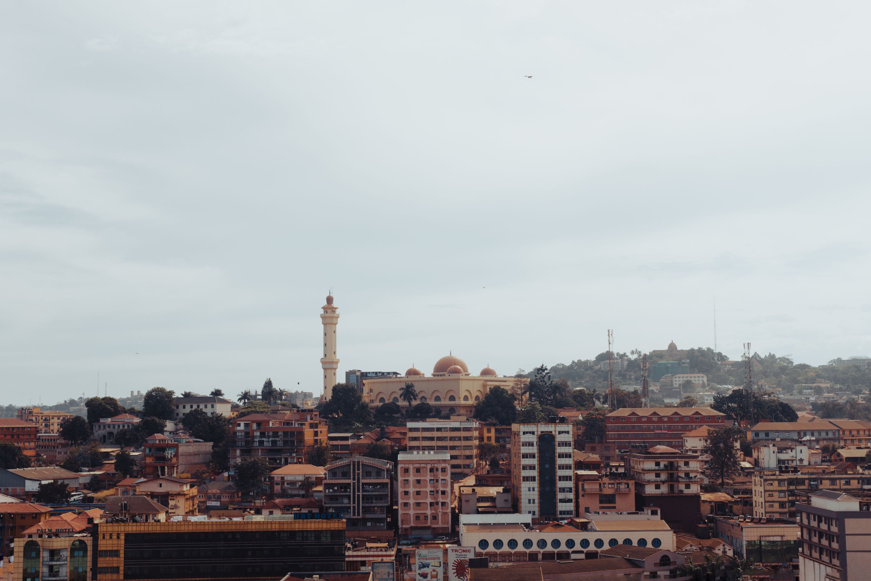 Scenic aerial view of Kampala with a beautiful mosque and urban landscape.