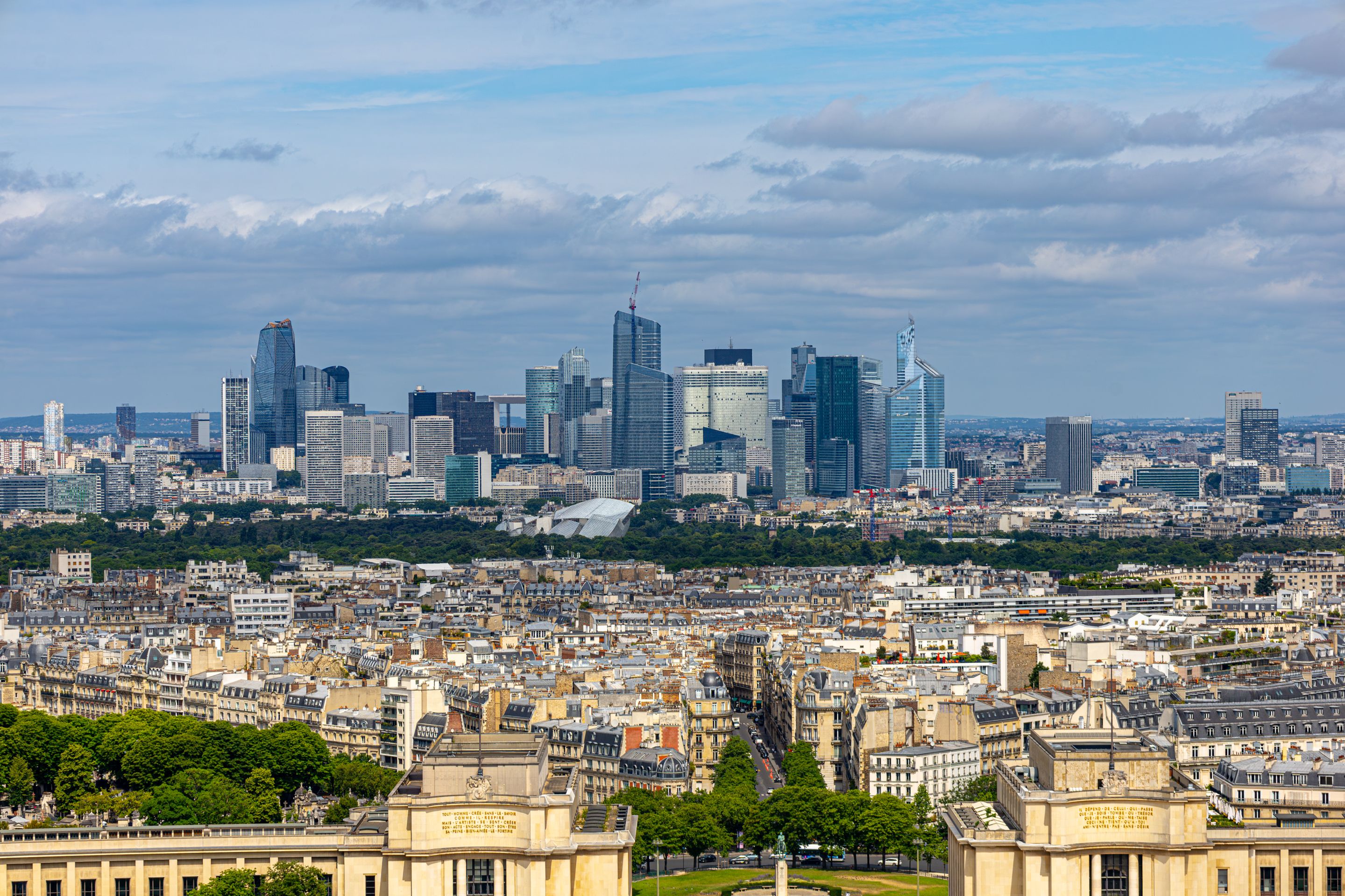 Aerial view of La Défense skyline in Paris with urban architecture and cityscape.